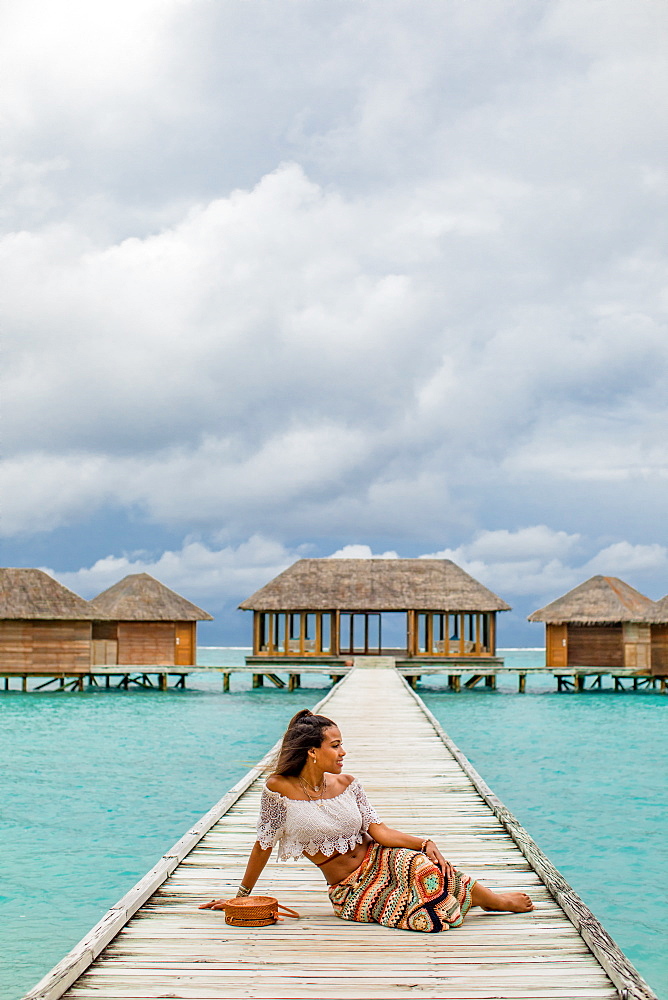 Relaxing at the Conrad Maldives Rangali Island over water yoga studio, Maldives, Indian Ocean, Asia