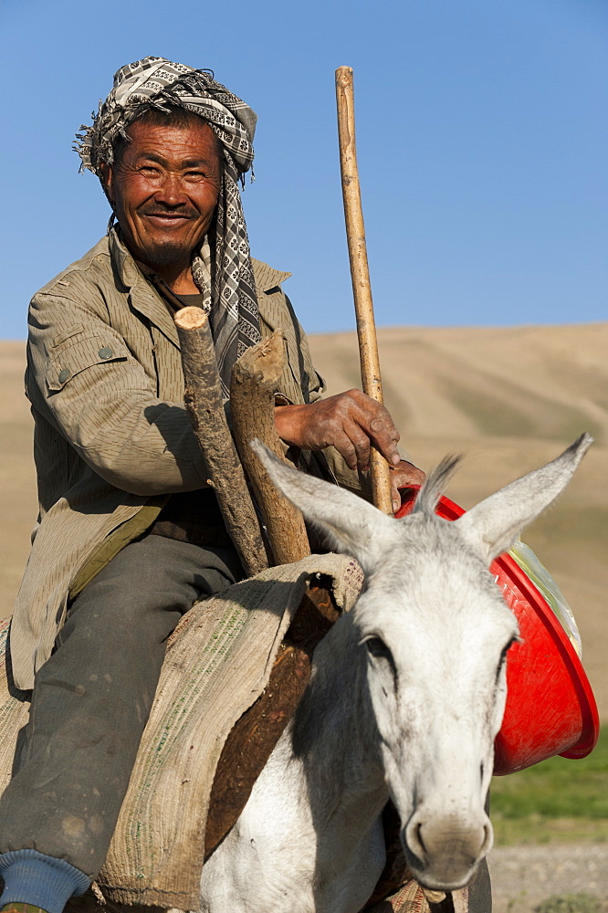 An Afghan farmer smiles for the camera in Bamiyan Province, Afghanistan, Asia