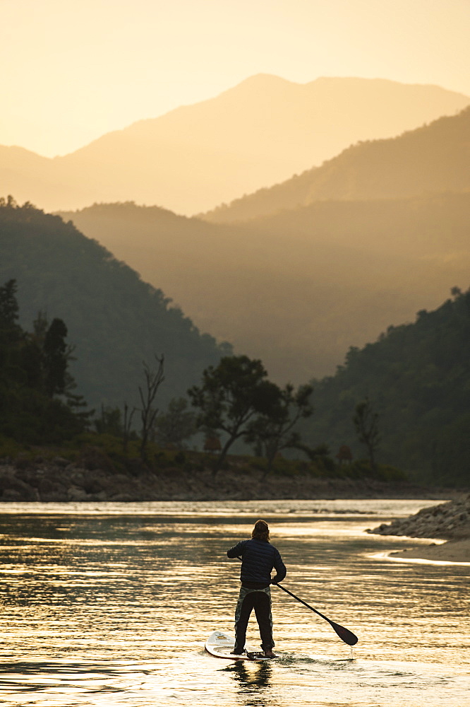 Stand Up Paddleboarding on the Karnali River, Nepal, Asia