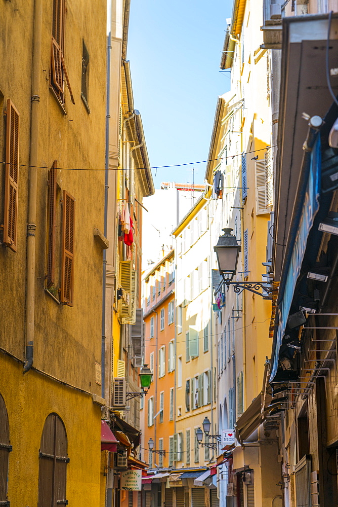 Narrow street in the Old Town, Vieille Ville, Nice, Alpes-Maritimes, Cote d'Azur, Provence, French Riviera, France, Mediterranean, Europe