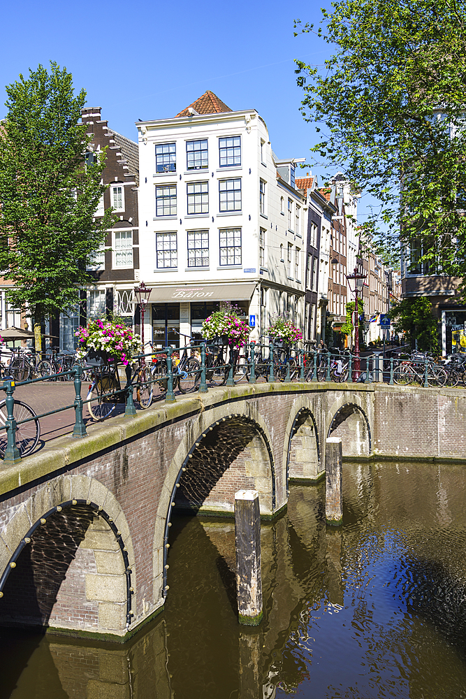 Bicycles on a bridge over the Herengracht canal, Amsterdam, North Holland, The Netherlands, Europe