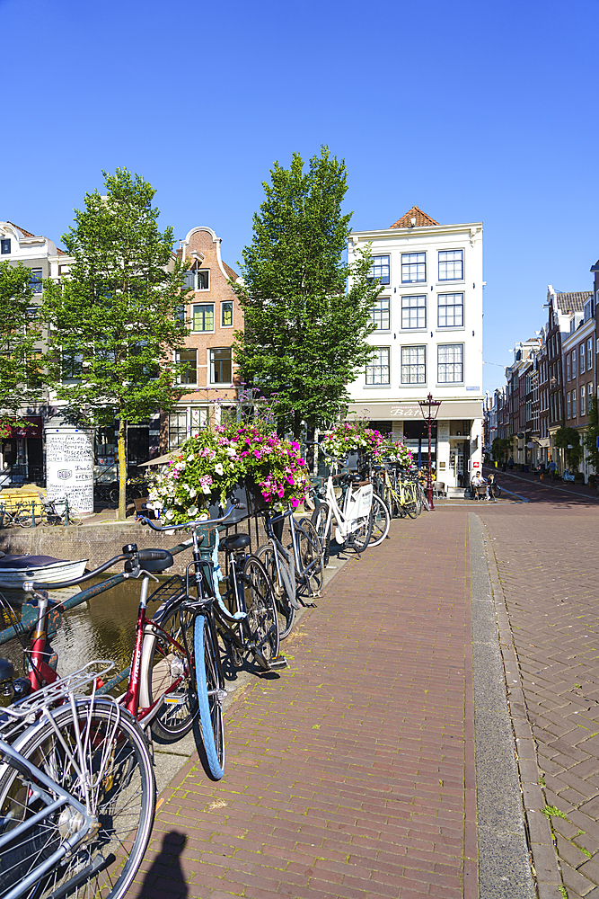 Bicycles on a bridge over the Herengracht canal, Amsterdam, North Holland, The Netherlands, Europe