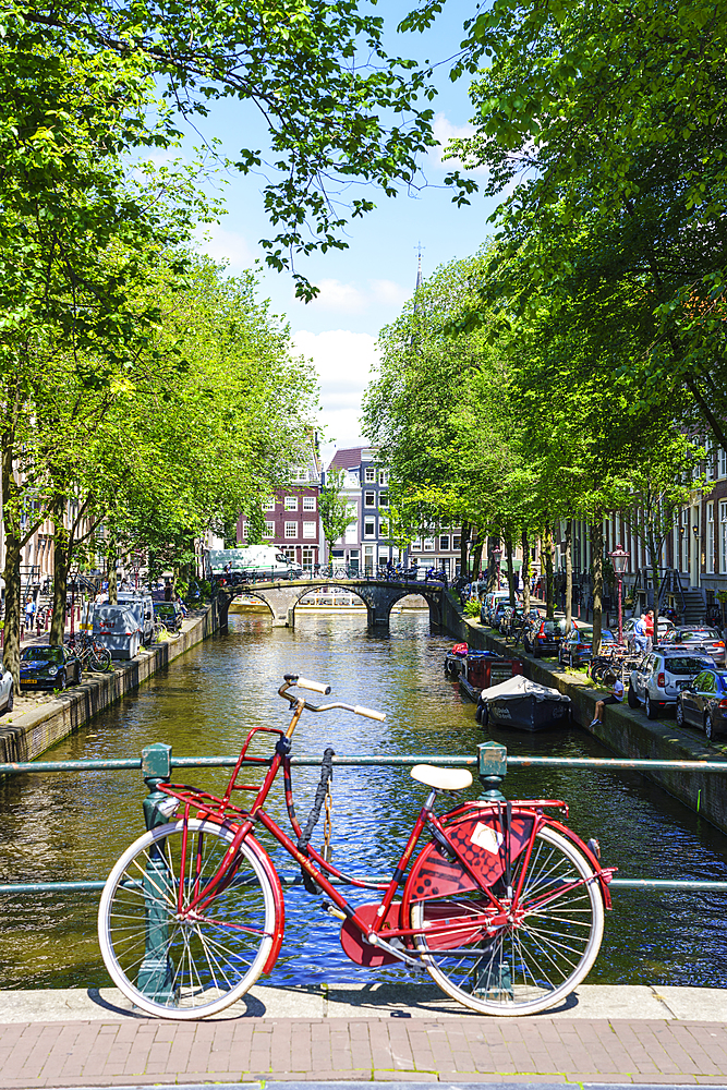 Bicycle on a bridge, Leidsegracht canal, Amsterdam, North Holland, The Netherlands, Europe