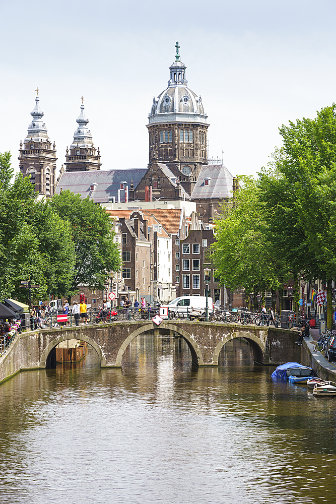 St. Nicholas Church (St. Nicolaaskerk) from Voorburgwal, Amsterdam, North Holland, The Netherlands, Europe