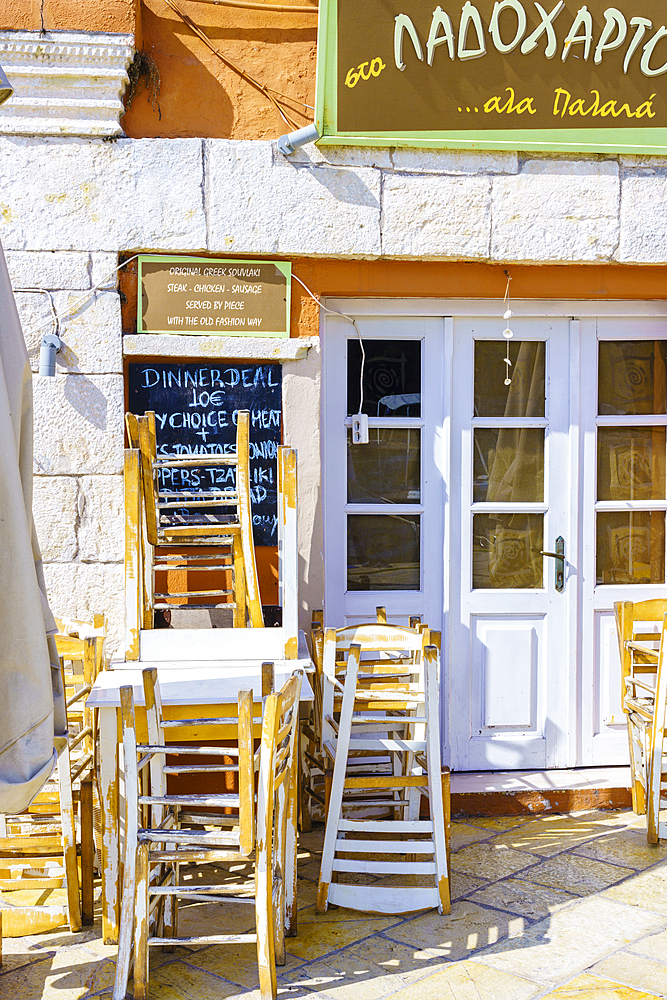 Taverna table and chairs, Gaios, Paxos, Ionian Islands, Greek Islands, Greece, Europe