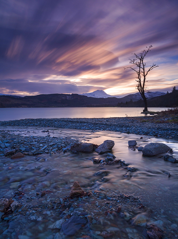 Sun setting over Ben Lomond and Loch Ard near Aberfoyle in the Lomond Trossachs National Park, Stirling, Scotland, United Kingdom, Europe