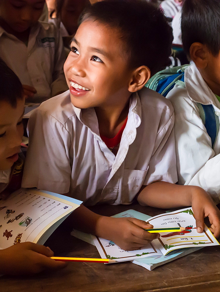 Young boy in school classroom, Houy Mieng, Laos, Indochina, Southeast Asia, Asia