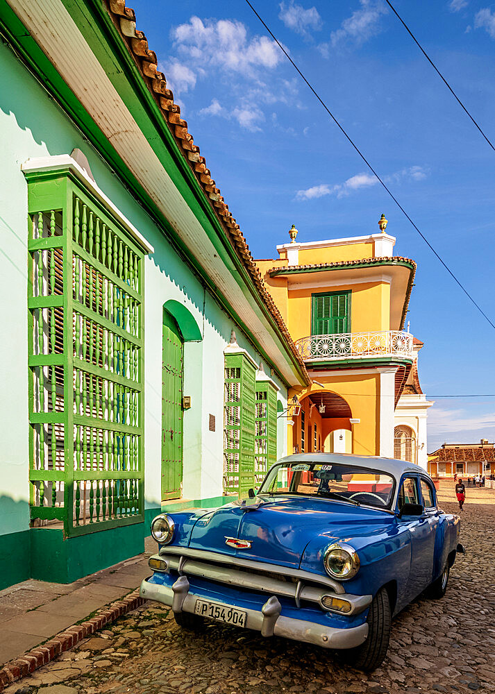 Vintage car on the cobbled street of Trinidad, Sancti Spiritus Province, Cuba, West Indies, Caribbean, Central America