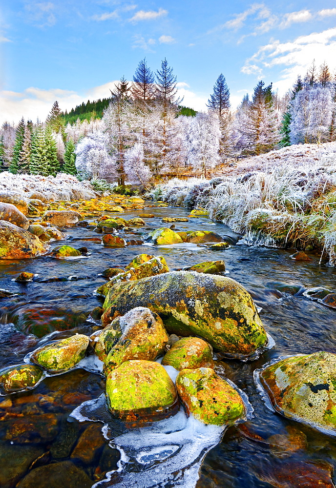 A winter view of the flowing water and colourful rocks of the River Polloch in the Ardnamurchan Peninsula, Scottish Highlands, Scotland, United Kingdom, Europe