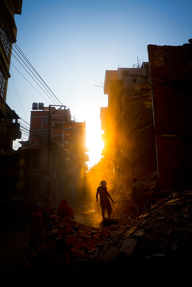 Rays of early evening sun on the dusty streets of Thamel after earthquake, Kathmandu, Nepal, Asia