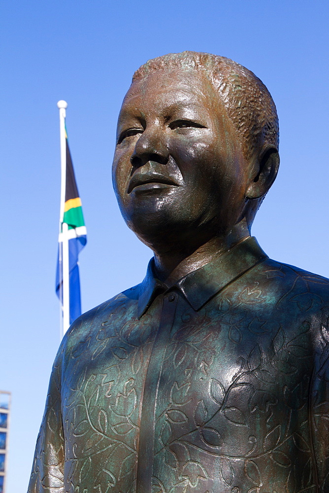 Nelson Mandela statue with South African flag, the Waterfront of Cape Town, South Africa, Africa