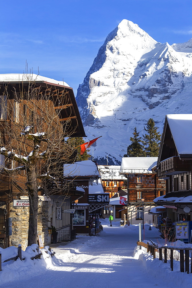 Traditional houses with Eiger in the background. Murren, Lauterbrunnen valley, Canton of Bern, Switzerland, Europe.