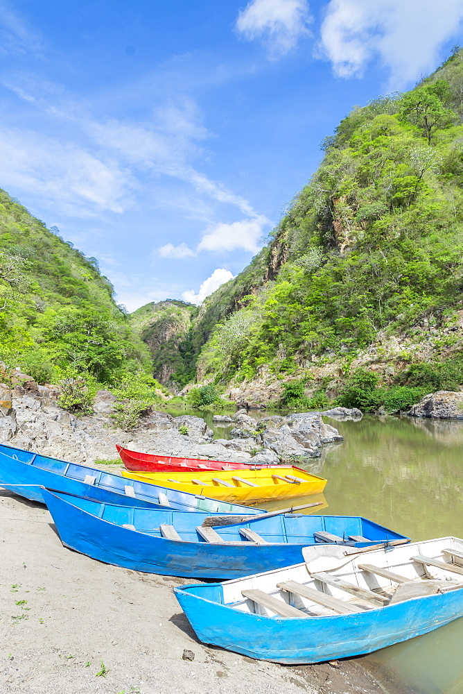 Small boats mooring at the entrance to the Somoto Canyon, Nicaragua, Central America