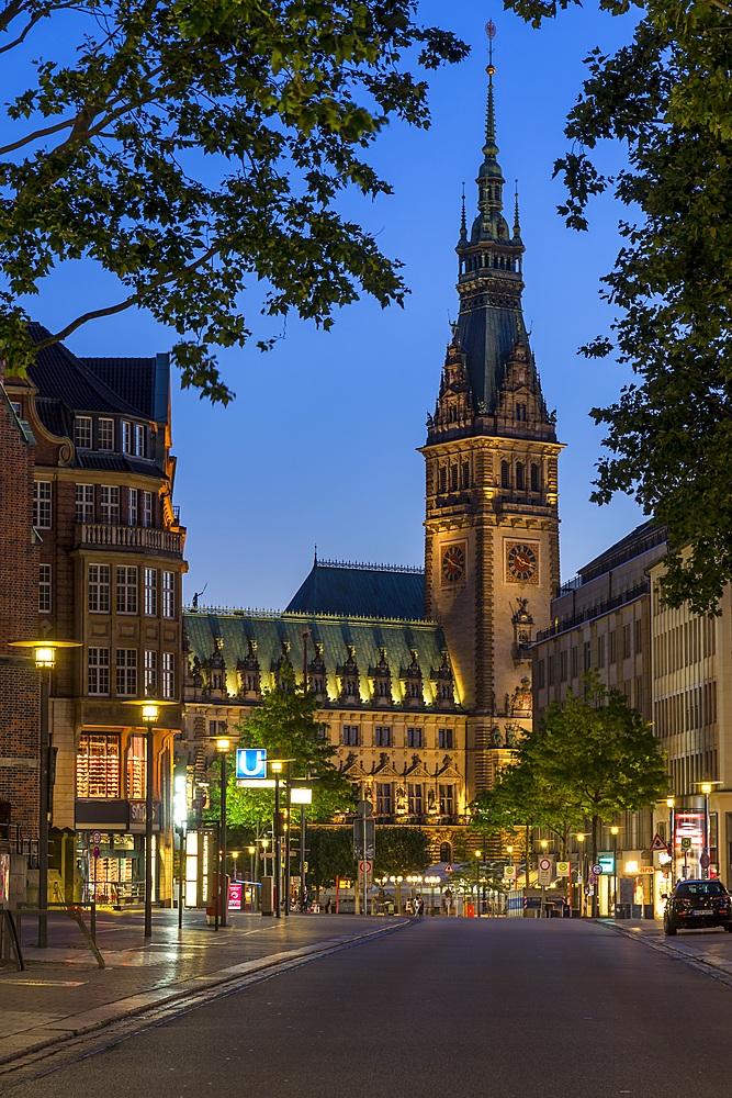 Illuminated town hall seen from Moenckebergstrasse at dusk, Hamburg, Germany, Europe