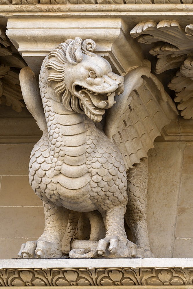 Telamons depicting grotesque figures or fantastic and allegorical animals, detail of the baroque facade, Church of Santa Croce, Lecce, Salento, Puglia, Italy