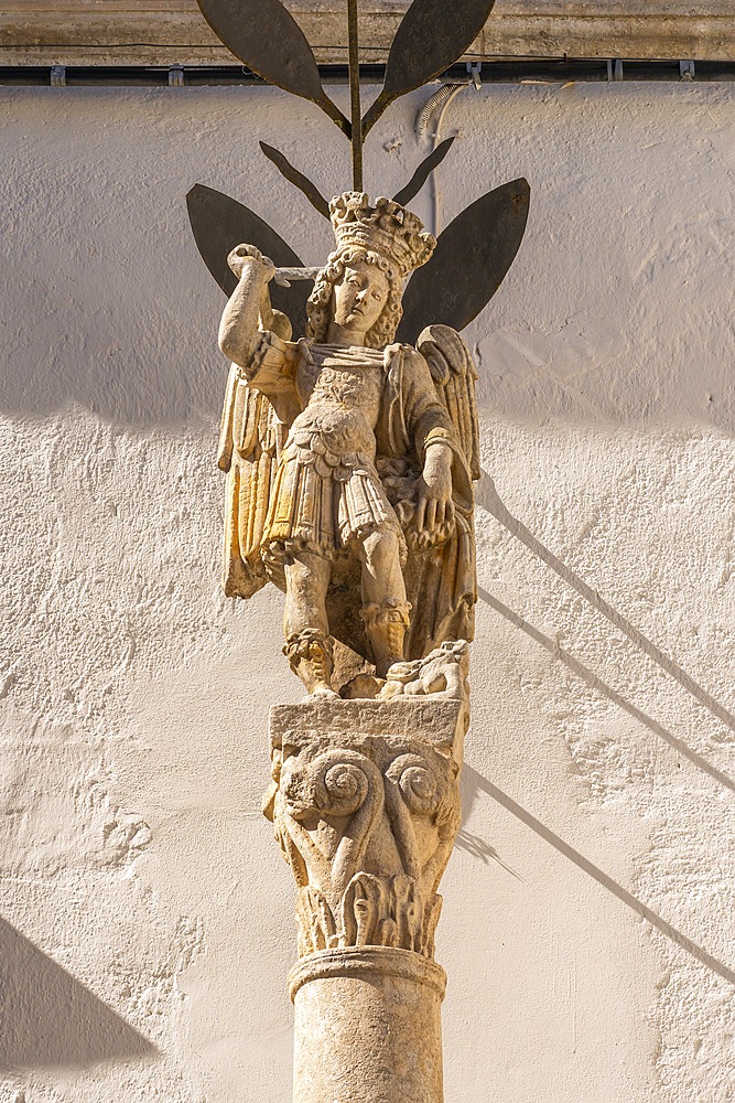 Gargano sculptor, Column with Saint Michael, 1656, Monte Sant'Angelo, via Reale Basilica, Monte Sant'Angelo, Foggia, Apulia, Italy