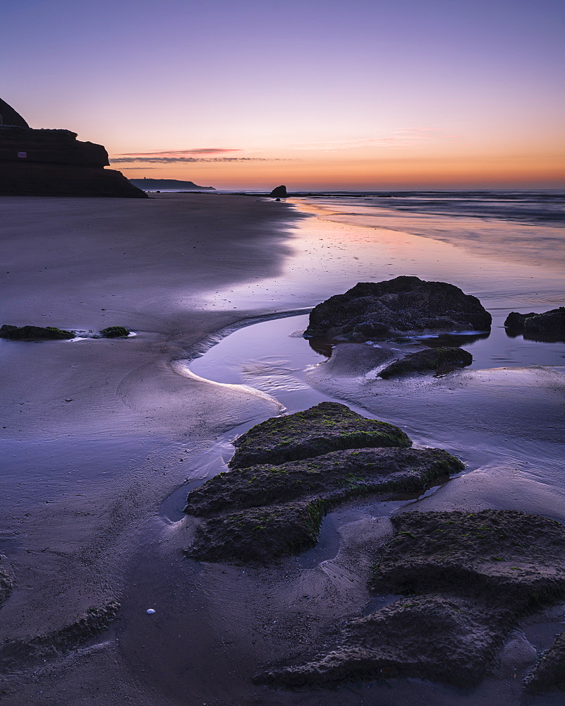 Dawn twilight with clouds on the beach at Orcombe Point, the Western end of the Jurassic Coast, UNESCO World Heritage Site, Exmouth, Devon, England, United Kingdom, Europe