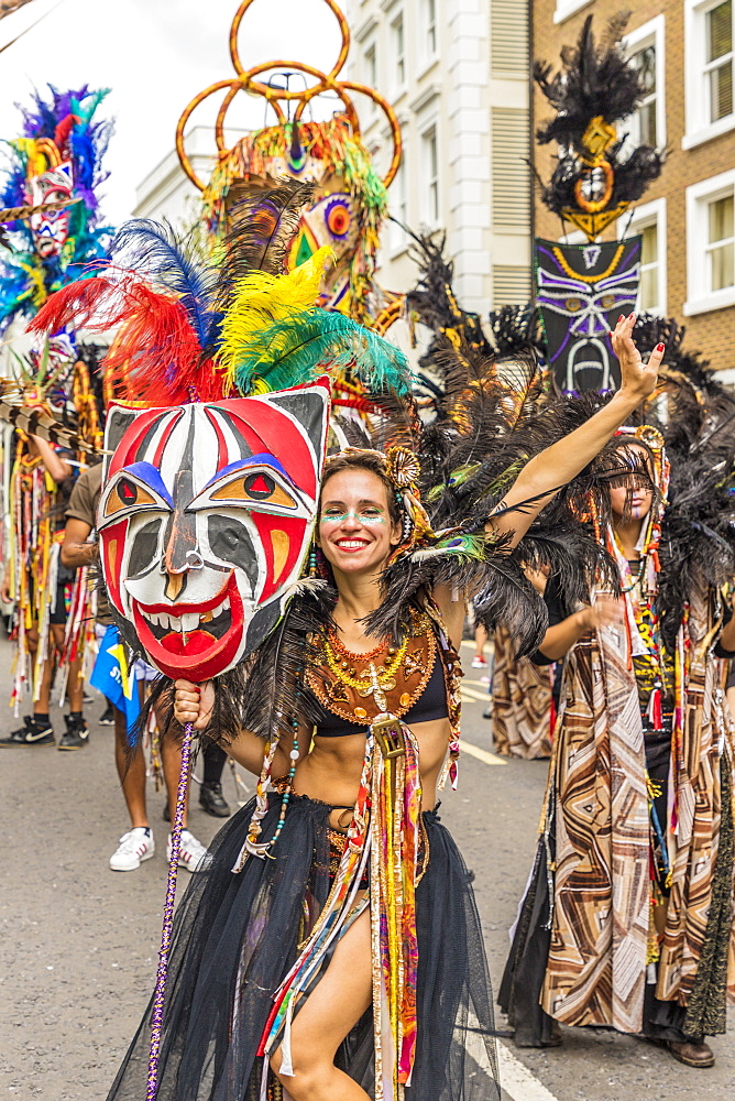 A colourfully dressed participant in the Notting Hill Carnival, London, England, United Kingdom, Europe