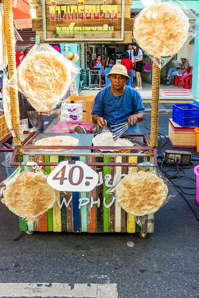 Thai chapatis being made at the famous Walking Street night market in Phuket old Town, Phuket, Thailand, Southeast Asia, Asia