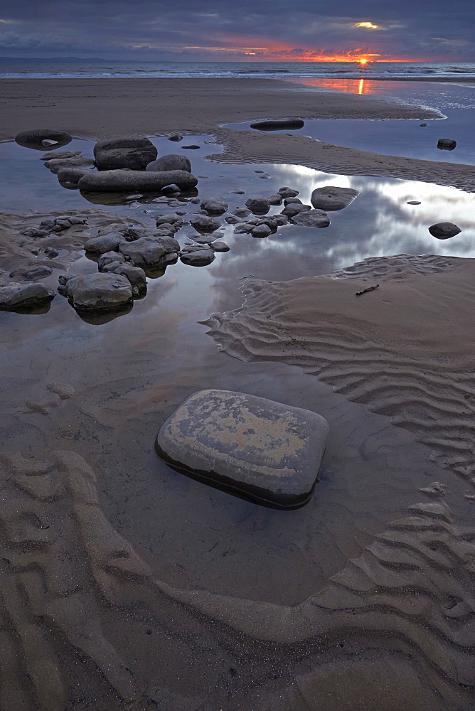 Tidal pools at sunset at Dunraven Bay, Southerndown, Glamorgan Heritage Coast, Wales, United Kingdom, Europe