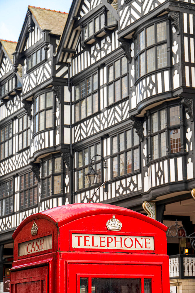 Telephone box on Northgate Street with historic buildings, Chester, Cheshire, England, United Kingdom, Europe