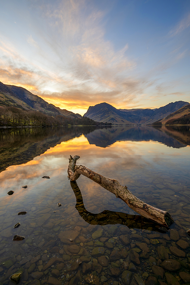 Lake Buttermere with Fleetwith Pike in the distance at sunrise, Lake District National Park, Cumbria
