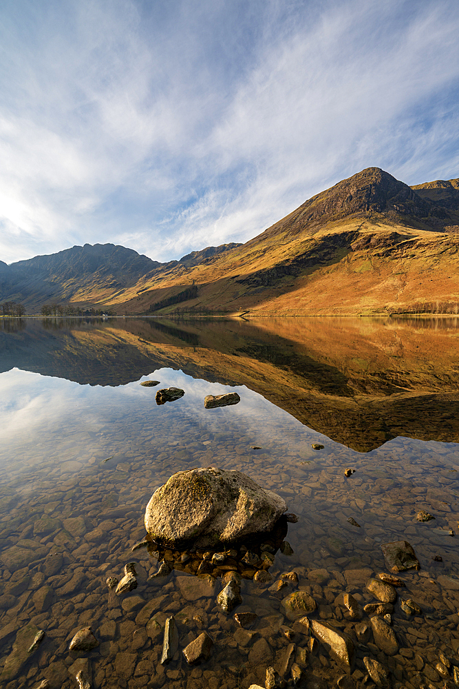 Lake Buttermere with mirrored reflections at sunrise, Lake District National Park, Cumbria