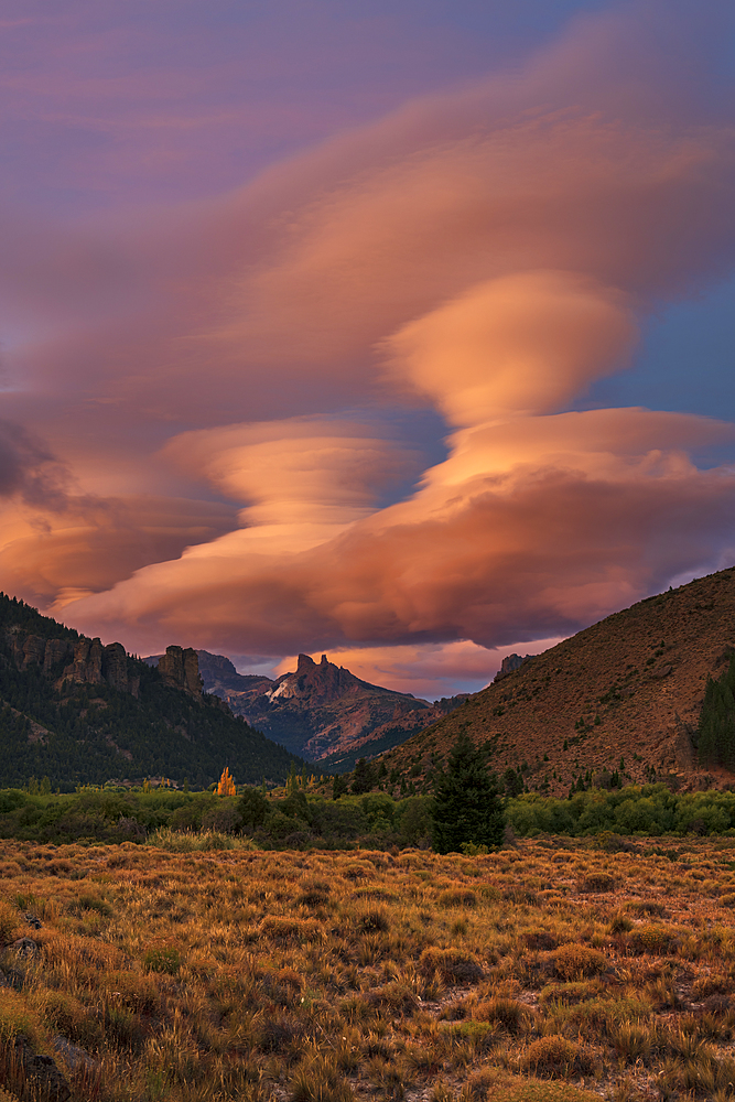 Lenticular cloud formation above The Chilean Saddle, Barilochie, Patagonia, Argentina, South America