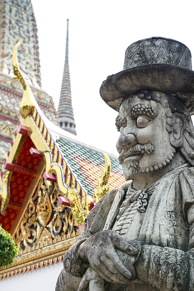 Close up of stone statue of guard in Wat Pho (Wat Phra Chetuphon) (Temple of the Reclining Buddha), Bangkok, Thailand, Southeast Asia, Asia