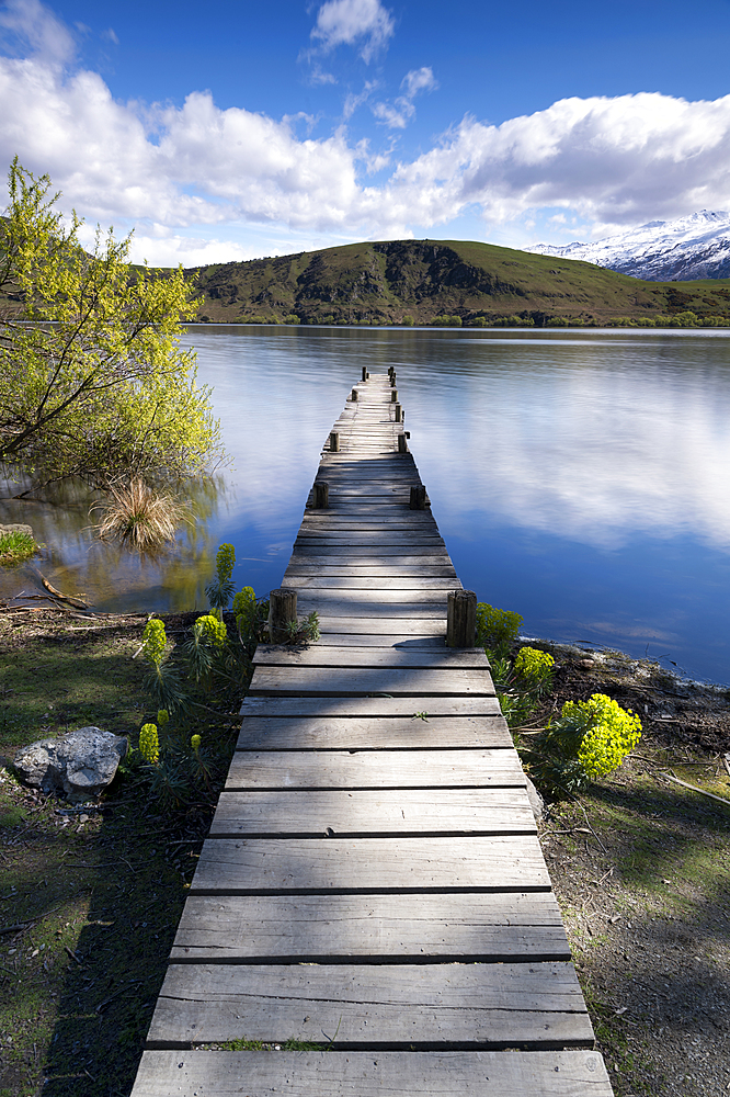 Old wooden jetty at Lake Hayes, Wakatipu Basin in Central Otago, South Island, New Zealand, Pacific