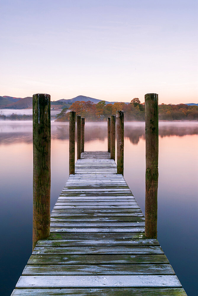 Wooden jetty at dawn, Derwentwater, Lake District National Park, UNESCO World Heritage Site, Cumbria, England, United Kingdom, Europe