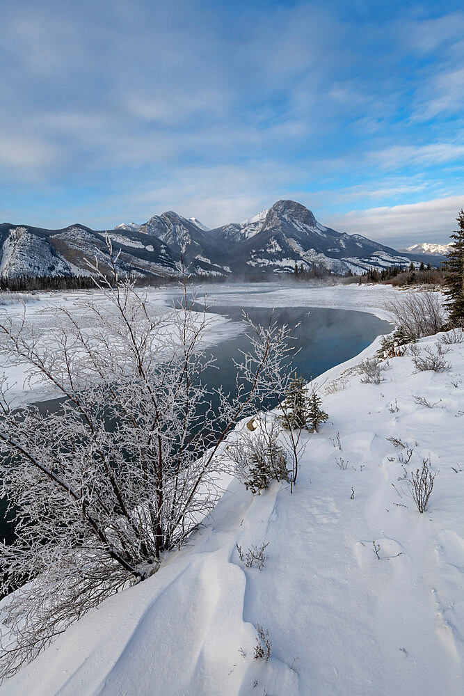 Bow River in winter with mountains, Jasper, Canadian Rocky Mountains, Alberta, Canada, North America