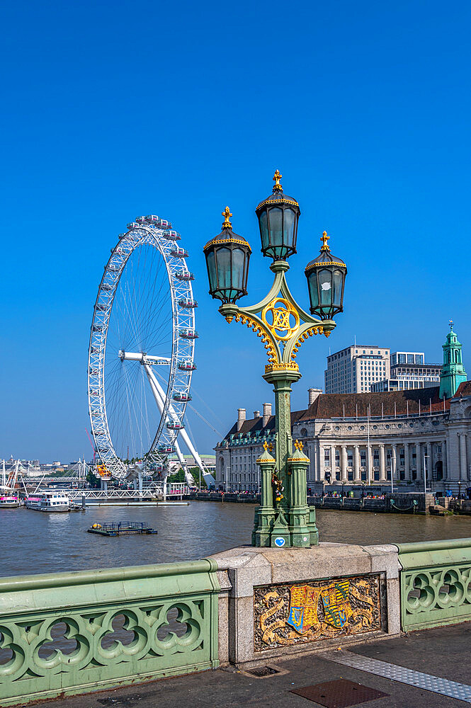 View of lamp post on Westminster Bridge with The London Eye, Westminster, London, England, United Kingdom, Europe