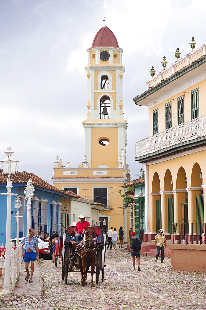 Street scene at Plaza Mayor with St. Francis Church in the background, Trinidad, UNESCO World Heritage Site, Cuba, West Indies, Caribbean, Central America