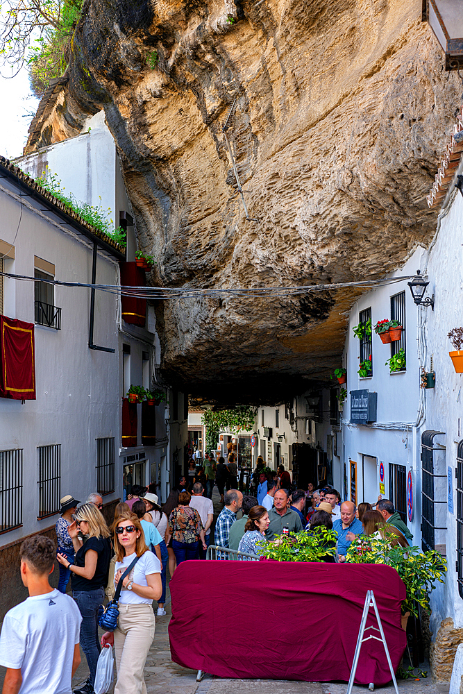 Street with white houses under a rock in Setenil de las Bodegas, Pueblos Blancos region, Andalusia, Spain, Europe