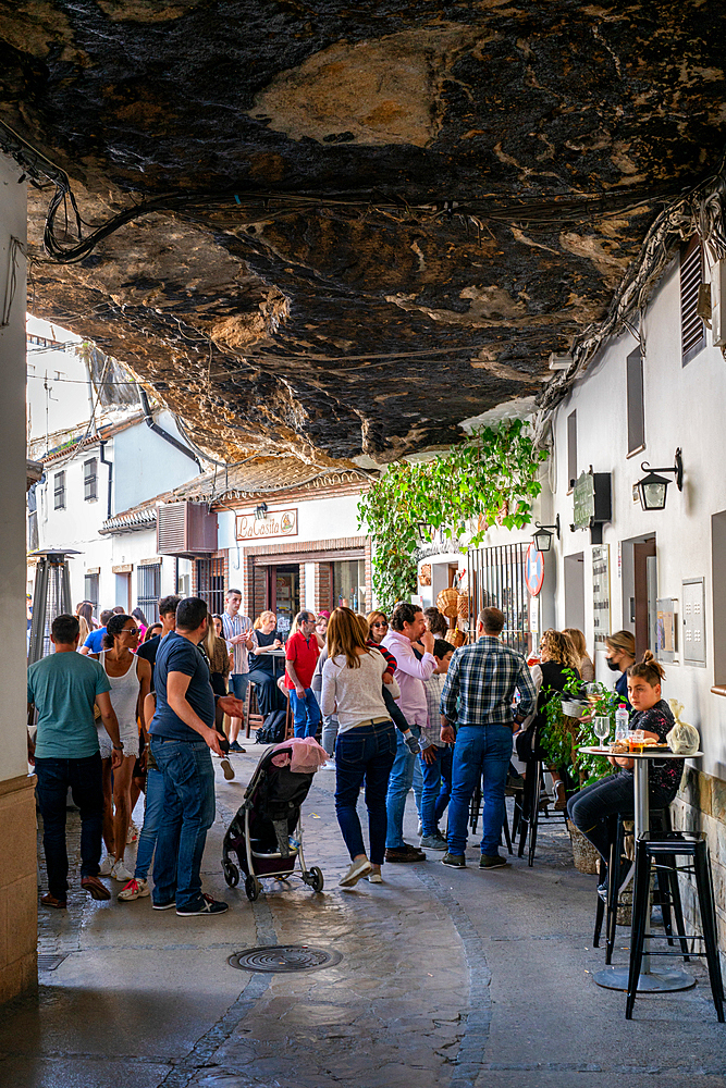 Street with white houses under a rock in Setenil de las Bodegas, Pueblos Blancos region, Andalusia, Spain, Europe