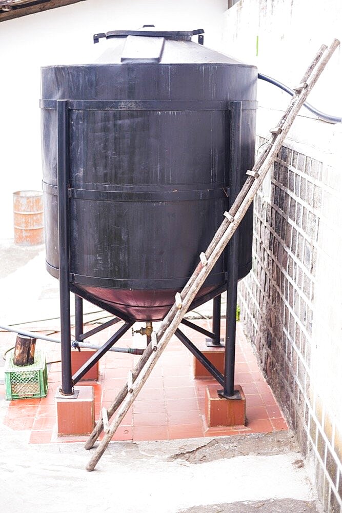 Whey container at the cheese factory at Hacienda Zuleta, Imbabura, Ecuador, South America