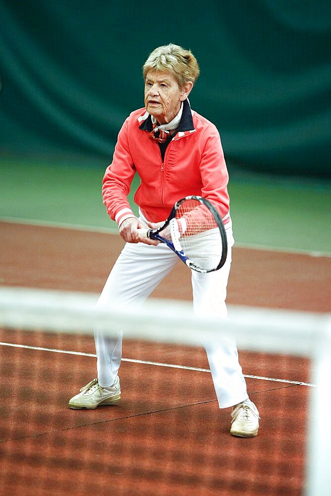 Senior practising a sport