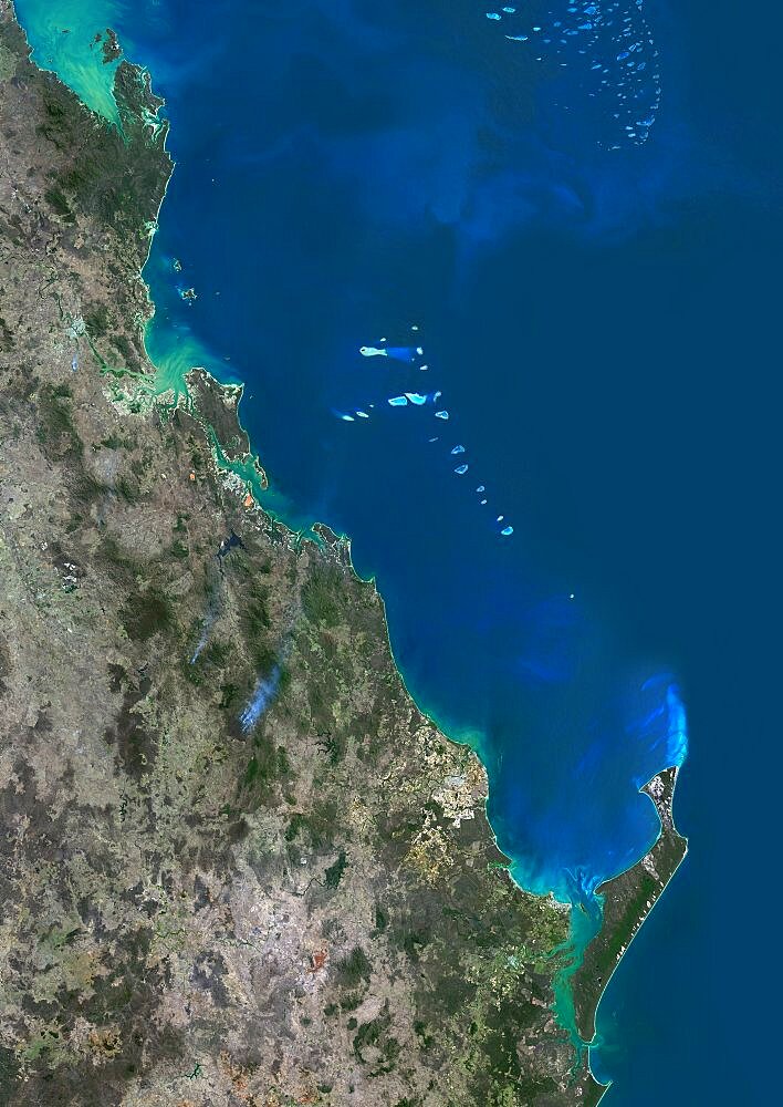 Satellite view of the Southern Great Barrier Reef and Fraser Island along Queensland's coastline in north-east Australia. This image was compiled from data acquired in 2014 by Landsat 8 satellite.