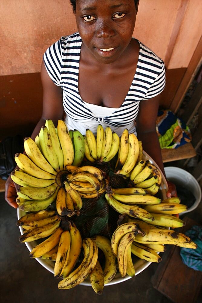 Girl selling bananas.