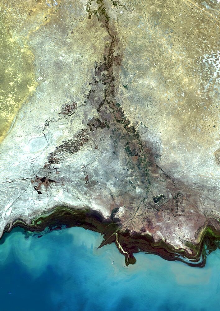 Ural Delta, Kazakhstan, True Colour Satellite Image. True colour satellite image of the Ural Delta in Kazakhstan. The Ural River ends at the Caspian Sea. Composite image using LANDSAT 5 data.