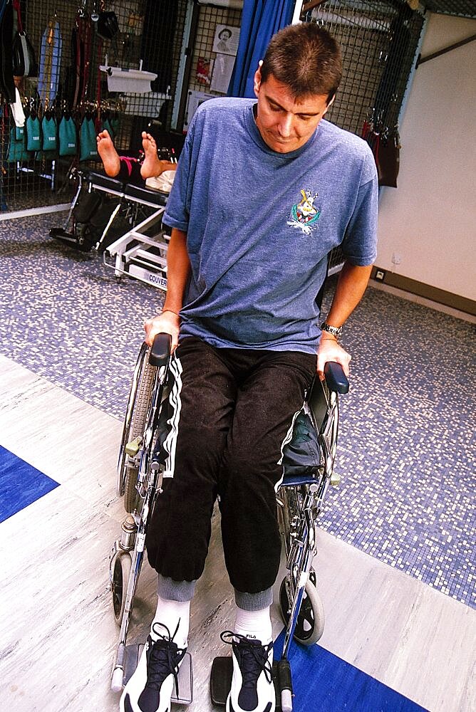 Paraplegic Man in Rehab Facility