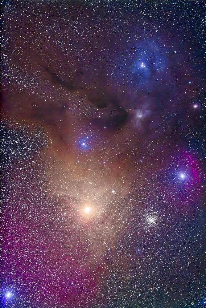 The colourful region around yellow Antares (bottom) in Scorpius and blue Rho Ophiuchi (top) in Ophiuchus. The nebulas are largely reflection nebulas, taking on the colour of the stars embedded in the nebulas. However, the field also contains a lot of emission nebulosity, hydrogen gas glowing red and magenta. Plus there are fingers of brown dark dusty nebulosity. It is one of the most colourful regions of the sky.