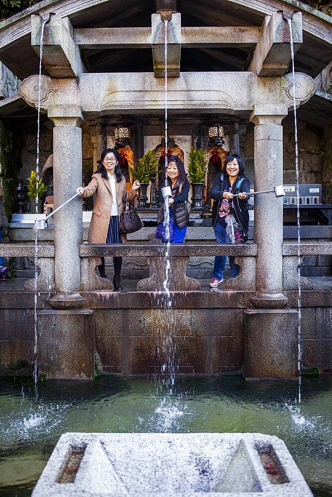 Golden water fountain, in Kiyomizu-dera temple, Kyoto. Kansai, Japan.