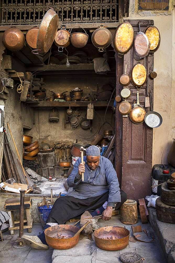 Metalworker, workshop in the Place as Seffarine. Fez.Morocco