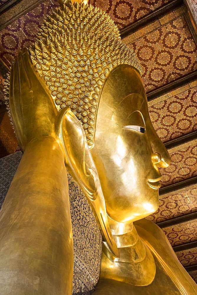 Golden big Buddha, in Wat Pho or Wat Phra Nakhon temple in Bangkok, Thailand