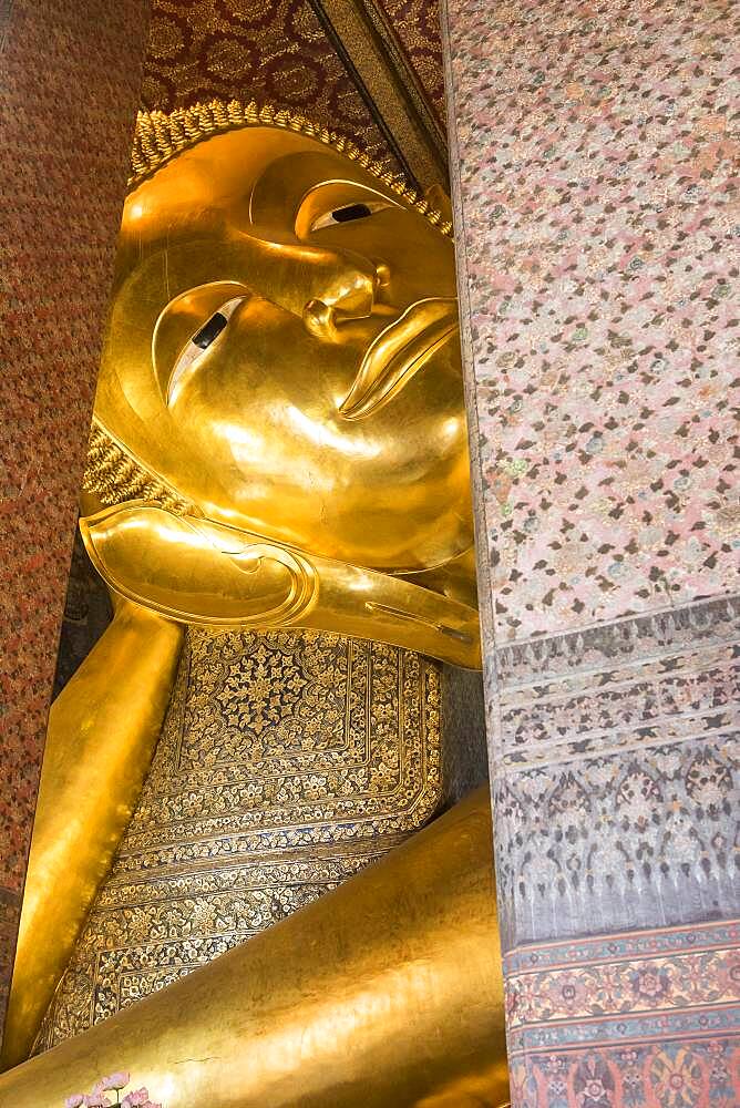 Golden big Buddha, in Wat Pho or Wat Phra Nakhon temple in Bangkok, Thailand