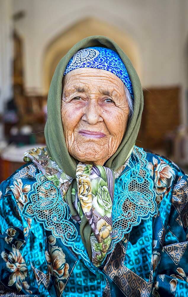 Umarova Saida, sunflower seeds vendor, in Taki-Telpak Furushon bazaar, Bukhara, Uzbekistan