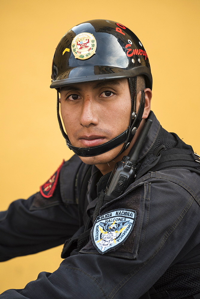 Policeman with national police force in Lima, Peru.