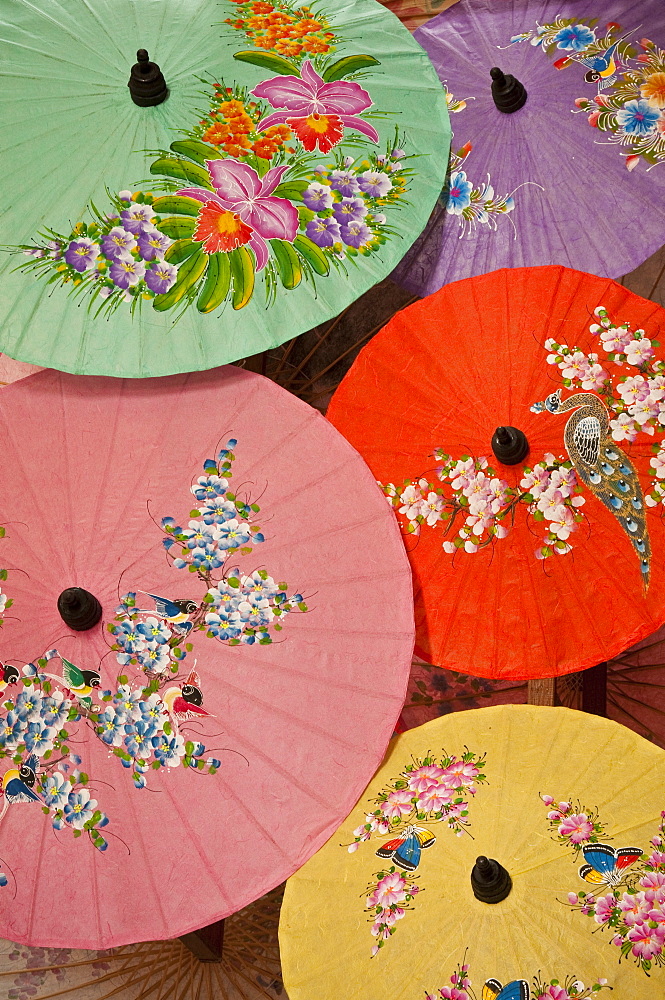 Hand-painted paper umbrellas at The Umbrella Factory in Chiang Mai, Thailand.